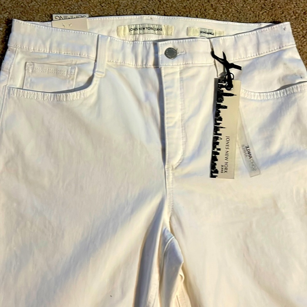 New with tags. Never worn. White blue jeans